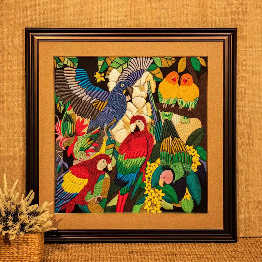 Tropical parrots silk embroidery closeup macaw cockatiel feather detail black fabric vibrant colors handmade bird art