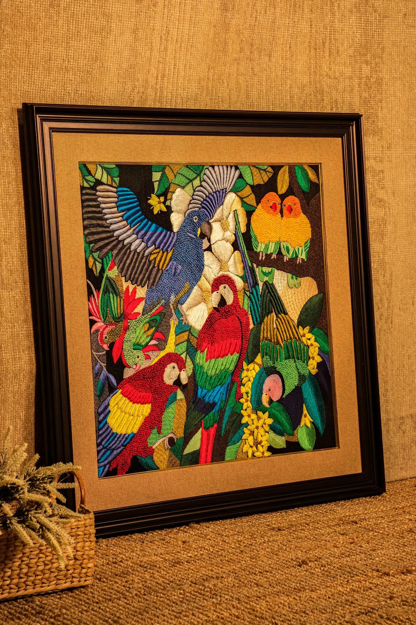 Exotic parrots embroidered wall art black gold frame tropical birds home decor lifestyle room setting handcrafted Iragai